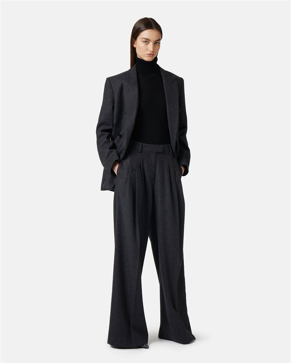 Trousers with pleats